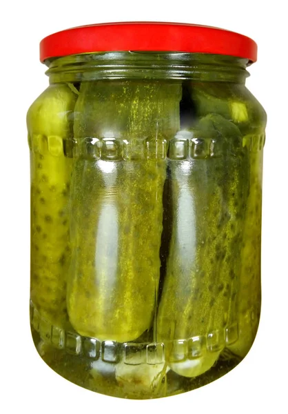 Pickled cucumbers in a glass jar — Stock Photo, Image