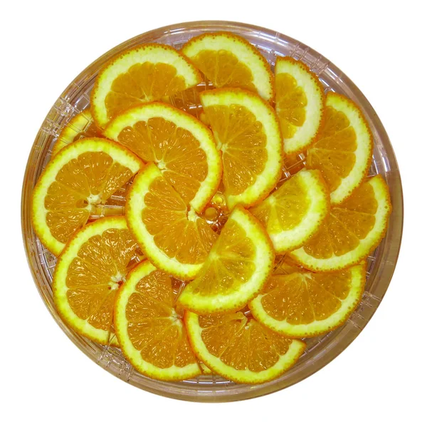 Medio rebanadas de naranja en el plato — Foto de Stock