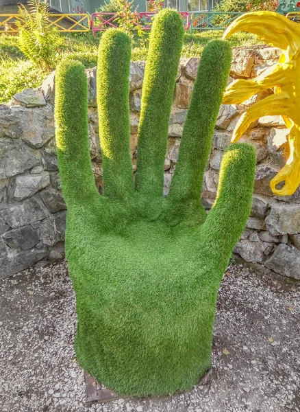 Green grass hand