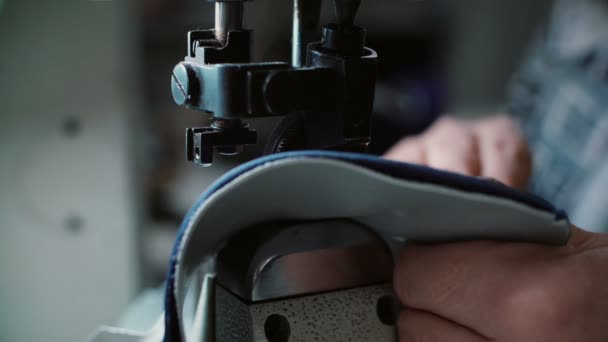 Close Footage Woman Sewing Blue Leather Some Textile Together Sewing — Stock Video