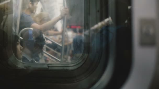 People Traveling Subway Train Car Seen Blurred Reflected Windows Motion — Stock Video