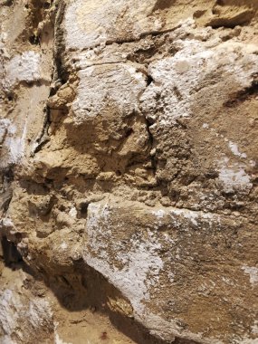 Tuğla duvar Kahverengi. Altın kahverengi tuğla işi. Duvarında kahverengi boya olan mimari bir nesne. tuğla duvar dokusu arkaplanı