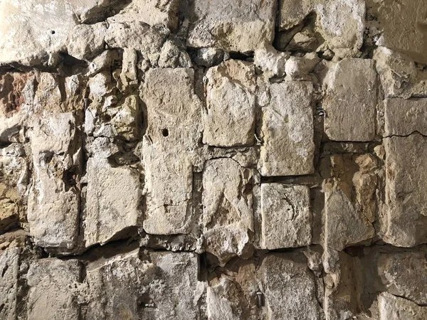Tuğla duvar Kahverengi. Altın kahverengi tuğla işi. Duvarında kahverengi boya olan mimari bir nesne. tuğla duvar dokusu arkaplanı