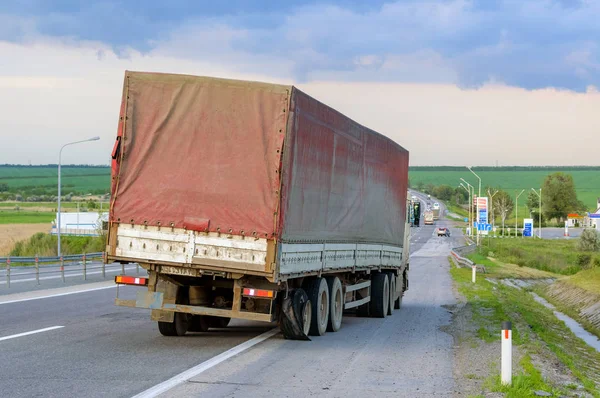 Flat out and damaged wheeler semi truck burst tires by highway s — Stock Photo, Image