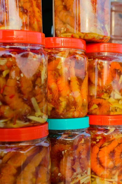 Pickled shrimp in glass cans