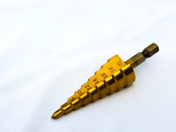 Conical Drill Titanium Drill Bit Hole Cutter HSS Steel Step. Selective focus with low depth of field — Stock Photo, Image