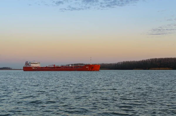 Tamker, cargo ship on the river on sunset — Stock Photo, Image