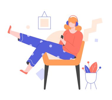 A young girl in headphones sits in a chair.