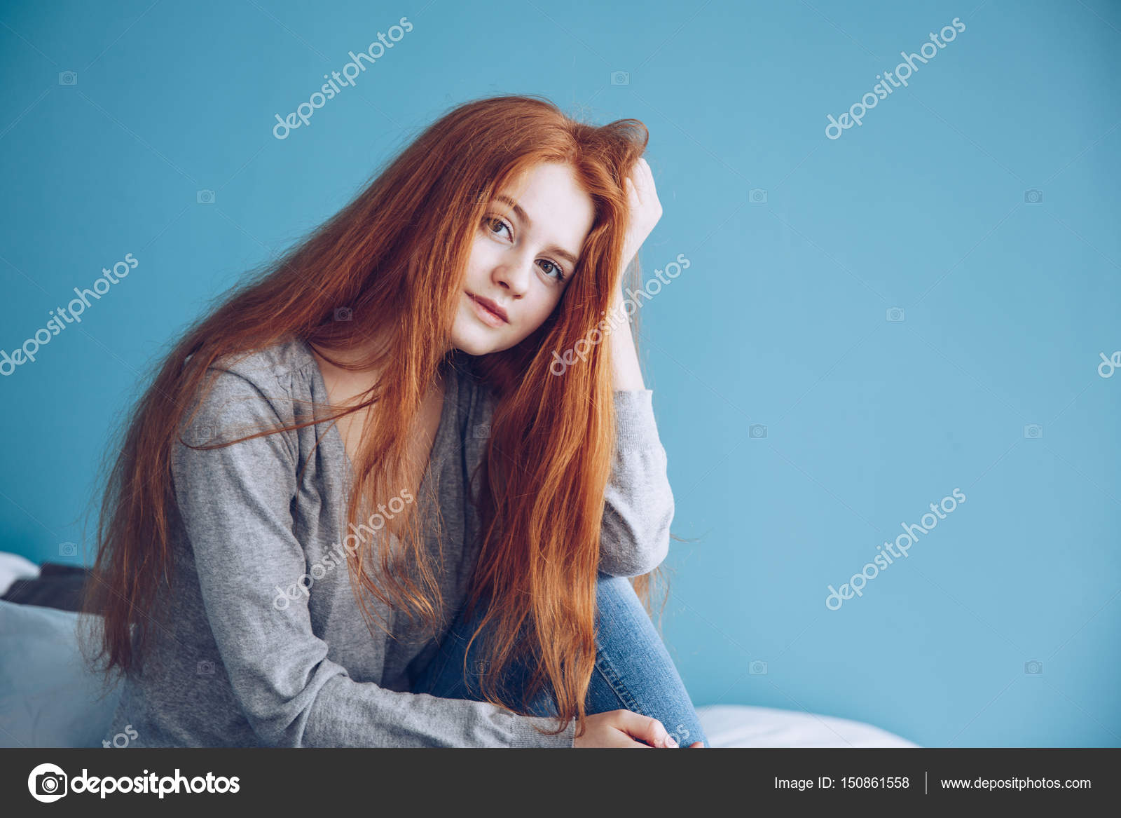 Portrait Of Cute Beautiful Young Girl With Freckles And Red Hair