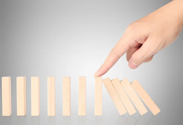 hand stop  dominoes continuous toppled