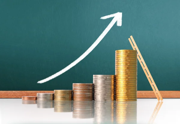 Coins graph stock market — Stock Photo, Image