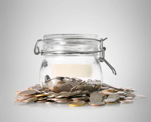 Silver coins in piggy bank Glass