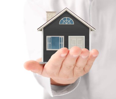 ev sahipliği temsil eden holding evi 