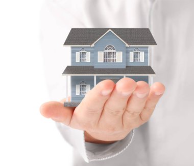 ev sahipliği temsil eden holding evi 