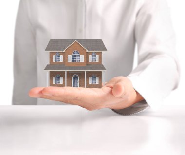 ev sahipliği temsil eden holding evi 