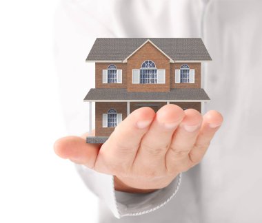 ev sahipliği temsil eden holding evi 
