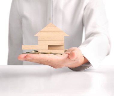 ev sahipliği temsil eden holding evi 