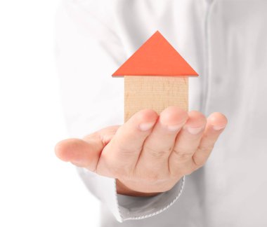 ev sahipliği temsil eden holding evi 