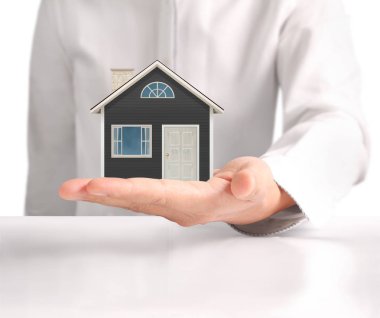 ev sahipliği temsil eden holding evi 