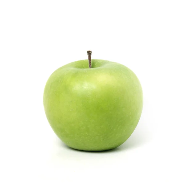 Повредить зеленому яблоку — стоковое фото