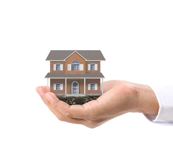 Conceito de hipoteca por casa na mão — Fotografia de Stock
