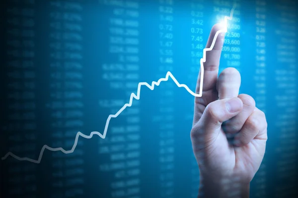 Affärsman med finansiella diagram symboler kommer från hand — Stockfoto