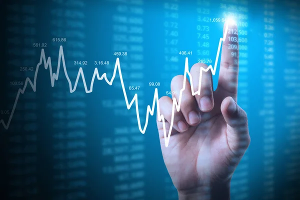 Geschäftsmann mit Finanzdiagramm-Symbolen aus der Hand — Stockfoto