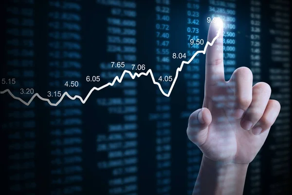 Geschäftsmann mit Finanzdiagramm-Symbolen aus der Hand — Stockfoto