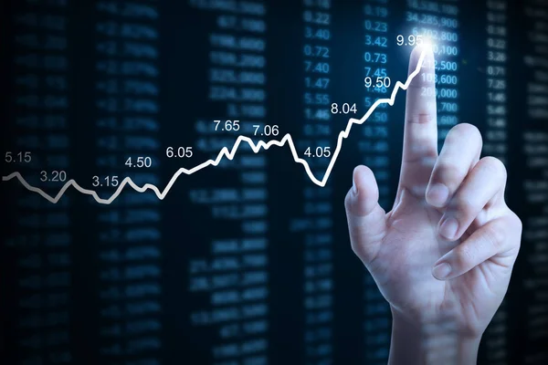 Geschäftsmann mit Finanzdiagramm-Symbolen aus der Hand — Stockfoto