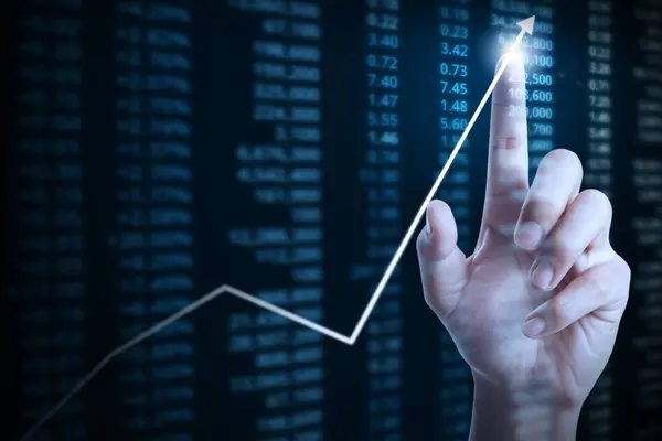 Geschäftsmann mit Finanzdiagramm-Symbolen aus der Hand — Stockfoto