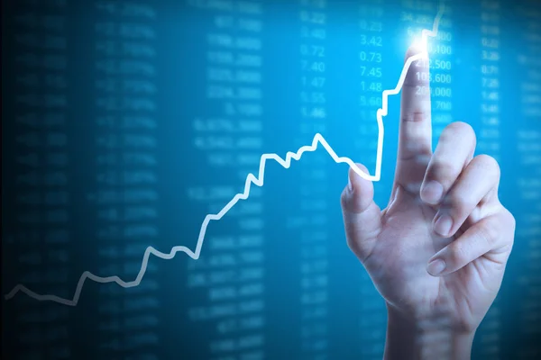 Affärsman med finansiella diagram symboler kommer från hand — Stockfoto