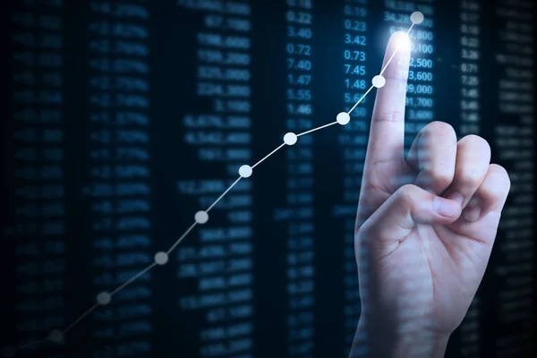 Affärsman med finansiella diagram symboler kommer från hand — Stockfoto