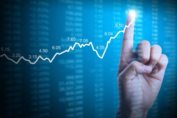 Affärsman med finansiella diagram symboler kommer från hand — Stockfoto