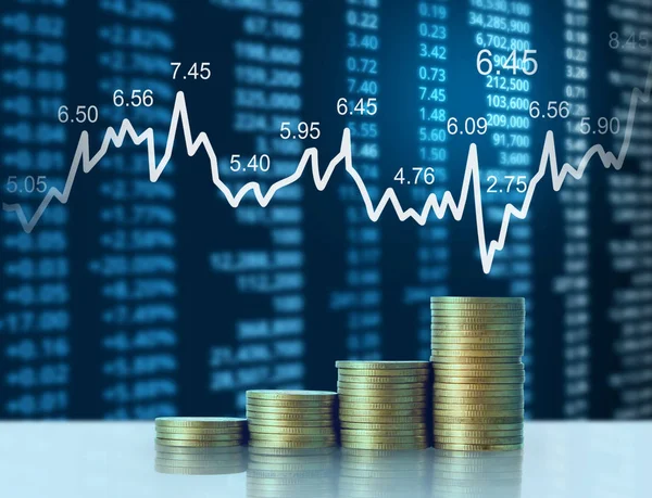 Coins graph stock market — Stock Photo, Image