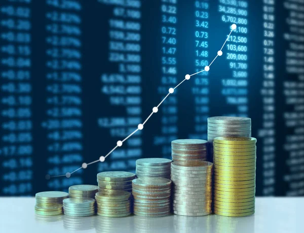 Coins graph stock market — Stock Photo, Image