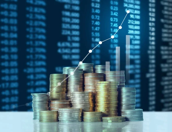 Coins graph stock market — Stock Photo, Image