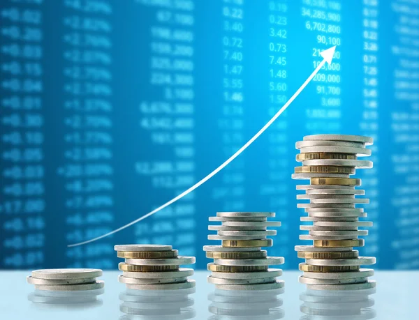 Coins graph stock market — Stock Photo, Image