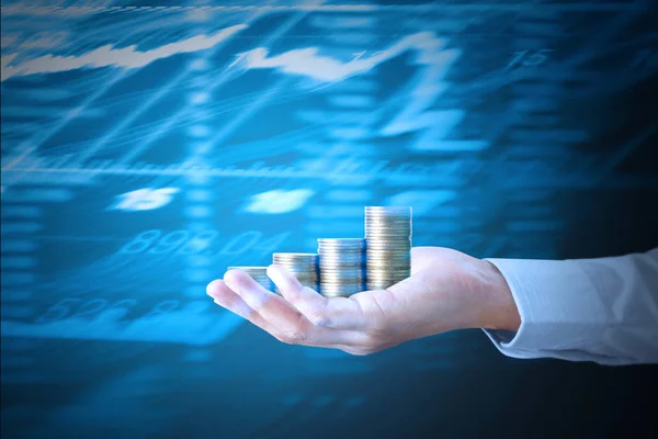 Hand human hand putting coin to money — Stock Photo, Image