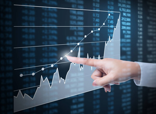 Investment concept,hand with financial chart symbols coming from hand