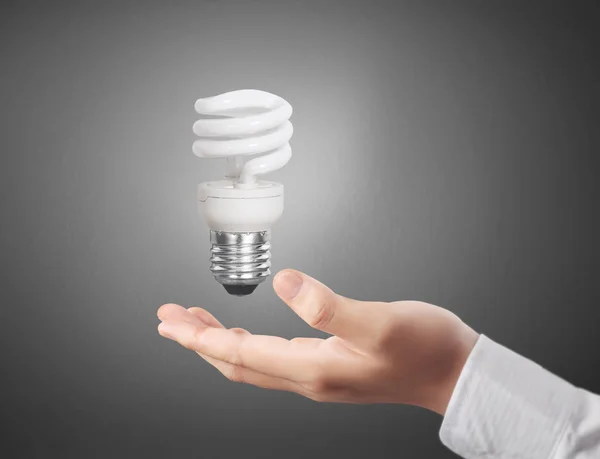Handen Håller Glödlampa Med Energi — Stockfoto