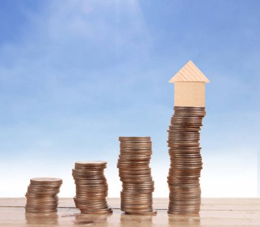 Bozuk para üzerindeki evin modeli.