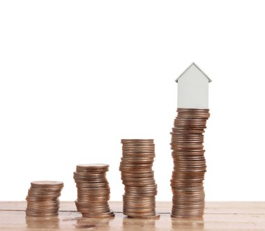 Bozuk para üzerindeki evin modeli.