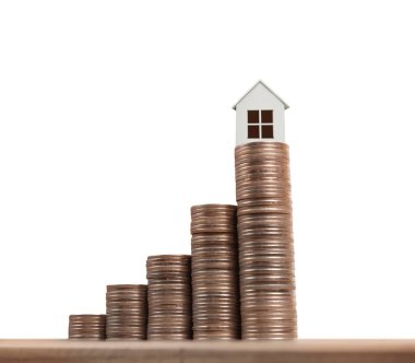 Bozuk para üzerindeki evin modeli.