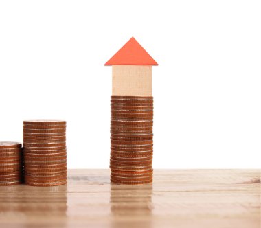 Bozuk para üzerindeki evin modeli.