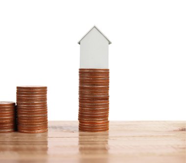 Bozuk para üzerindeki evin modeli.