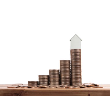 Bozuk para üzerindeki evin modeli.