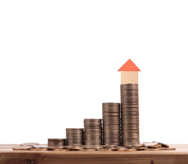 Bozuk para üzerindeki evin modeli.