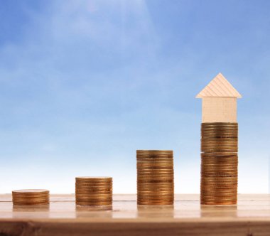 Bozuk para üzerindeki evin modeli.