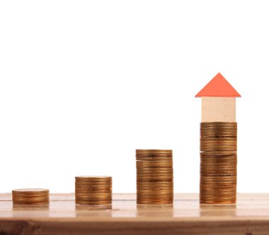 Bozuk para üzerindeki evin modeli.