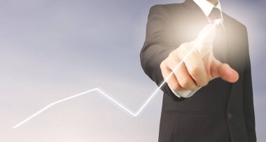  İşadamı planı büyüme ve grafik olumlu indicato artması